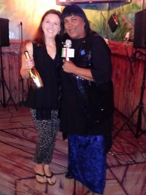 Angela McCloskey and Dr. Khalilah Camacho-Ali with Lamborghini Brand Champagne - Gold Bottle - Luxury Chamber Orlando Chapter