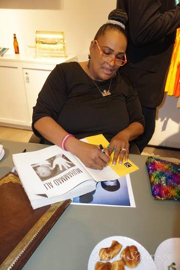 Dr. Khalilah Camacho-Ali signing Muhammad Ali Book